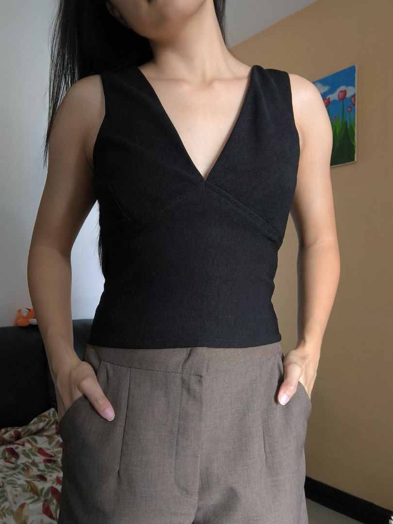 MissyM V-Neck Sleeveless Top (Category: Sleeveless) located in Pasig City. Submitted by gaosorio17 (Listing ID 1460319516, Image 1). Description: - MissyM brand from orange app - Used only once - Very stretchy so it fits XS to M - Perfect for a night out!.