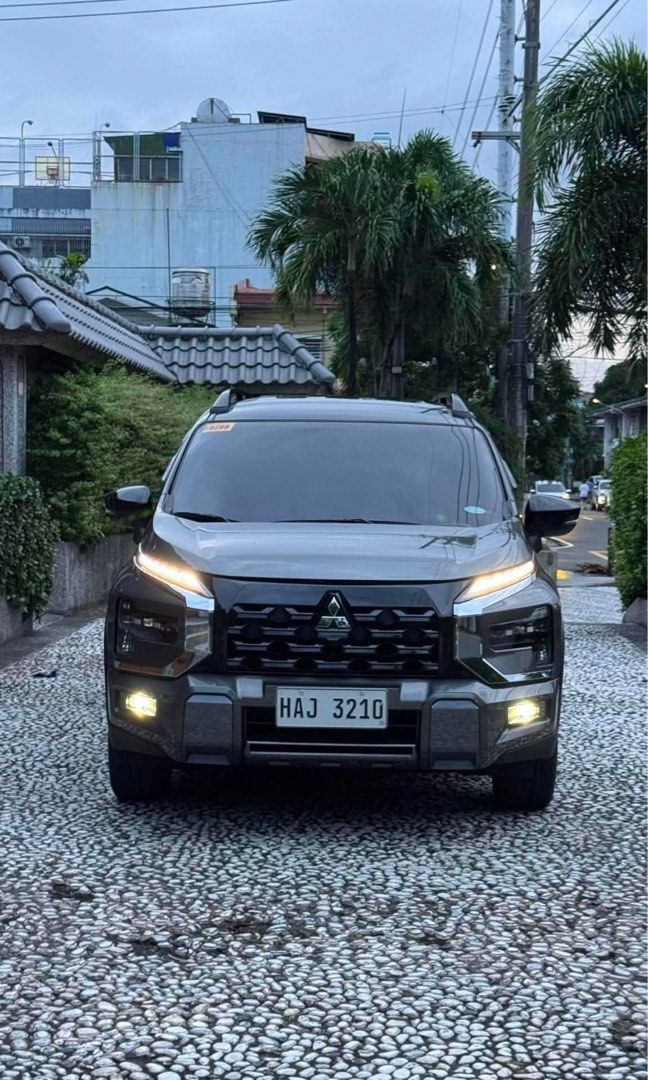 Mitsubishi Xpander Cross (New Look) Auto (Category: Used Cars) located in Manila. Submitted by quality_cars (Listing ID 1460412735, Image 1). Description: FOR SALE‼️ Mitsubishi Xpander Cross ( New Look ) 2026 model - Green Bronze Metallic 2k flat mileage. ( PASS AS BRANDNEW ) Price: ₱1,045,000 negotiable, - With 2 Original Car Keys - With Service Record & Manual Booklet - Equipped with 360 Camera - Mags casa marking still intact - Interior and Ex