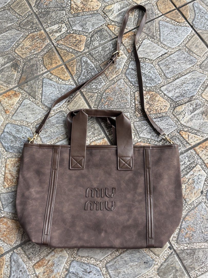 MIU MIU BAG (Category: Cross-body Bags) located in Manila. Submitted by psg_ni_gecko (Listing ID 1460305994, Image 1). Description: Brandnew Brown Location: Mandaluyong.