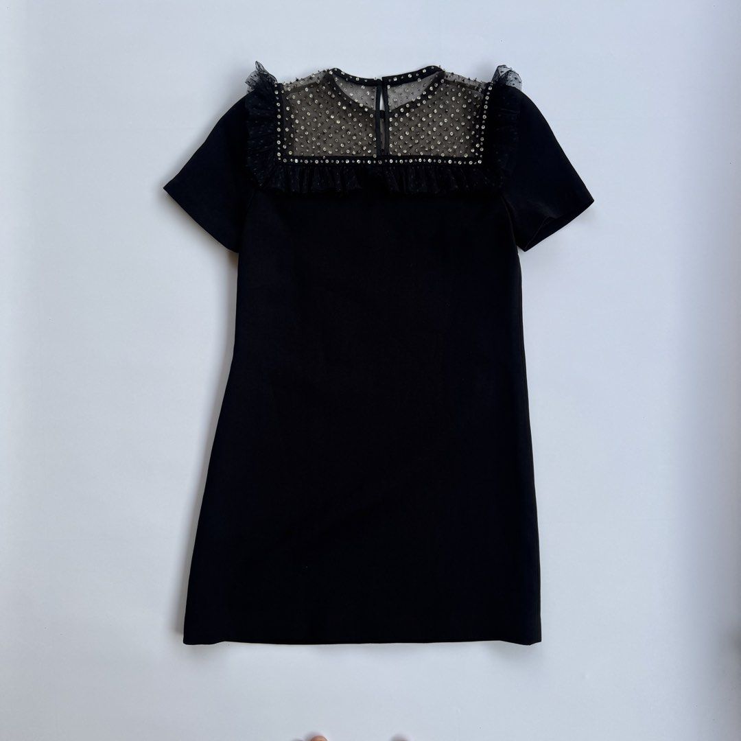 Miu Miu Mid Dress (Category: Luxury Apparel) located in Iloilo. Submitted by 50houndidz (Listing ID 1460430436, Image 2). Description: Miu Miu Mid Dress excellent no issue size:38 measurements: 16 pit to pit 33 length dm for more questions .