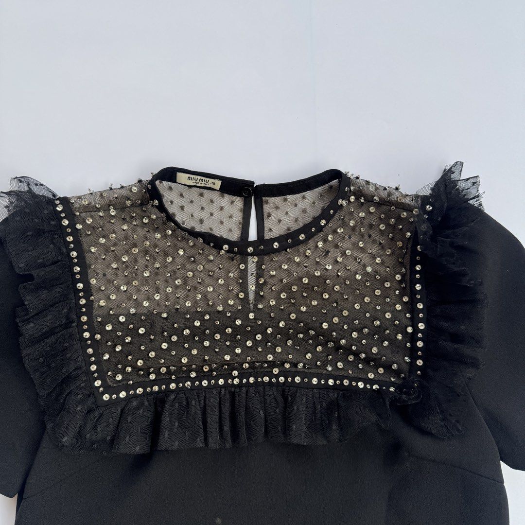 Miu Miu Mid Dress (Category: Luxury Apparel) located in Iloilo. Submitted by 50houndidz (Listing ID 1460430436, Image 3). Description: Miu Miu Mid Dress excellent no issue size:38 measurements: 16 pit to pit 33 length dm for more questions .