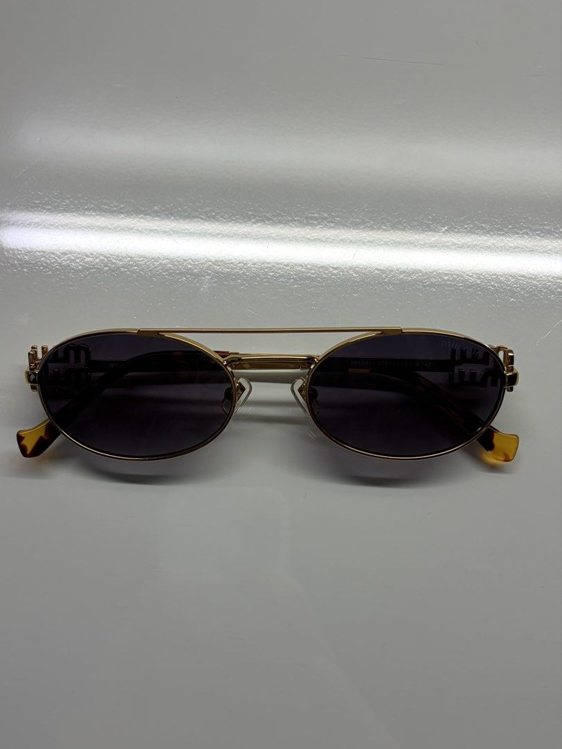 miumiu sunglasses (mint condition) (Category: Sunglasses & Eyewear) located in Paranaque City. Submitted by sofsclosettt (Listing ID 1460415979, Image 2). Description: - lightly used only! full inclusions (dust bag, lens cloth, case, paper, box) - japan preloved source 🇯🇵 authentic - rfs: i have so many shades and don’t get to wear these often :( - open to offers for sure buyers! .