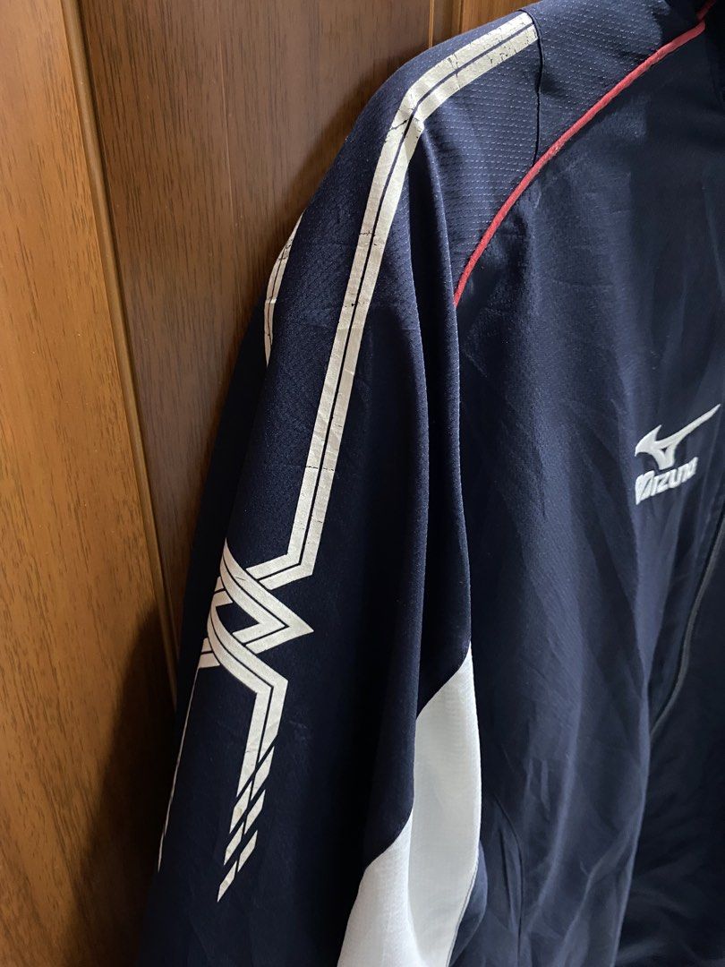 Authentic Vintage Mizuno Windbreaker / Track / Running Jacket (Category: Coats, Jackets and Outerwear) located in Cavite. Submitted by lovedbyniz (Listing ID 1460432816, Image 3). Description: • condition: 8/10 - has tags, original! - working zipper, the bottom is just stuck but it can be fixed - prints on the shoulder part has some cracks - white parts on sleeves just need thorough washing. not stains, just dust/dirt from storage so it’s 100% re