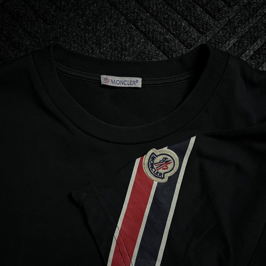 Moncler Tricolour Shirt (Category: Tshirts & Polo Shirts ) located in Davao. Submitted by archived.status (Listing ID 1460480771, Image 3). Description: COLOR MAY VARY DUE TO LIGHTING‼️ Condition: 9.5/10 Color rate: 9.5/10 Issue: minimal hairlines on sleeve design Size Small fit Medium Width 20 Length 27.