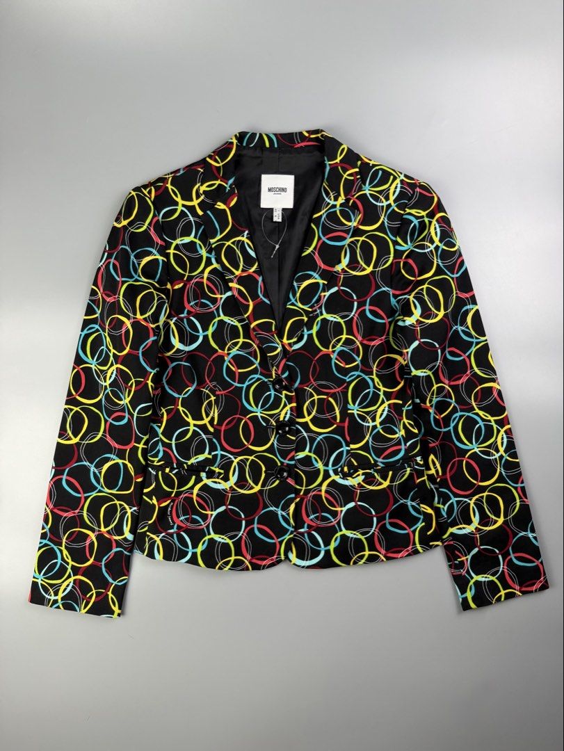 Moschino Jeans Donna - Circles Pattern Jacket (Category: Coats, Jackets and Outerwear) located in Pasig City. Submitted by on_the_trend (Listing ID 1460488909, Image 1). Description: Tagged size: I 40, USA 6, F 36 Condition: 9.5/10 Material: 98% Cotton, 2% Elastane Made in: Romania Measurement: Width: 16 inches Shoulder: 15 inches Length: 21” (Back) / 22” (Front) Sleeve length: 23 inches.