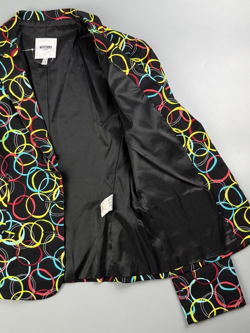 Moschino Jeans Donna - Circles Pattern Jacket (Category: Coats, Jackets and Outerwear) located in Pasig City. Submitted by on_the_trend (Listing ID 1460488909, Image 2). Description: Tagged size: I 40, USA 6, F 36 Condition: 9.5/10 Material: 98% Cotton, 2% Elastane Made in: Romania Measurement: Width: 16 inches Shoulder: 15 inches Length: 21” (Back) / 22” (Front) Sleeve length: 23 inches.