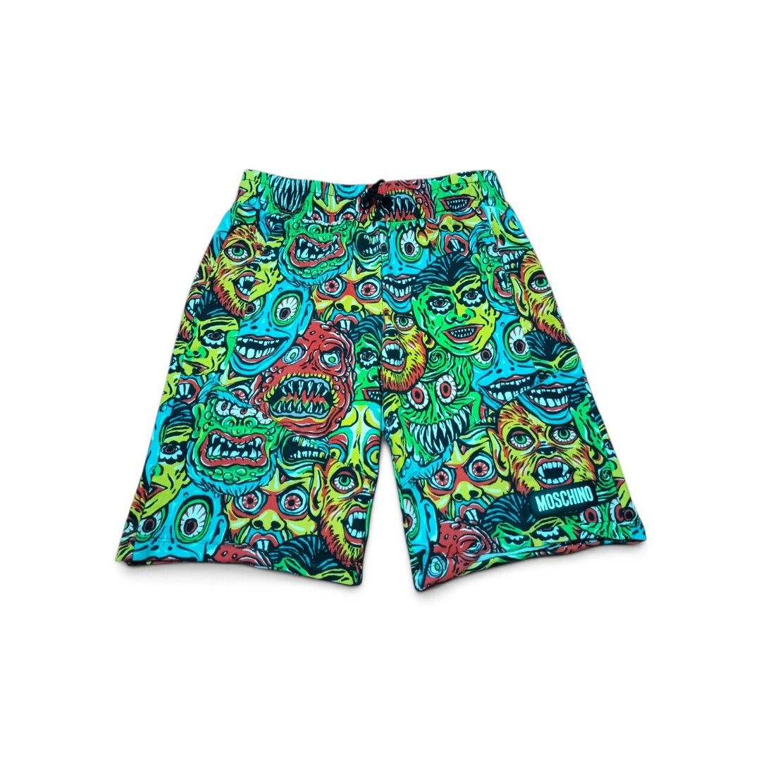 Moschino Monster Print Shorts (Category: Babies & Kids Fashion) located in Manila. Submitted by southstreethub.ph (Listing ID 1460430019, Image 1). Description: - Eye-catching Moschino shorts with a fun, all-over monster print. - Vibrant, bright colors that stand out. - Comfortable elastic waistband with an adjustable drawstring. - Size: 24-26 Waist - Ideal for summer wear or casual lounging. - Refer to pictures for detailed condition..