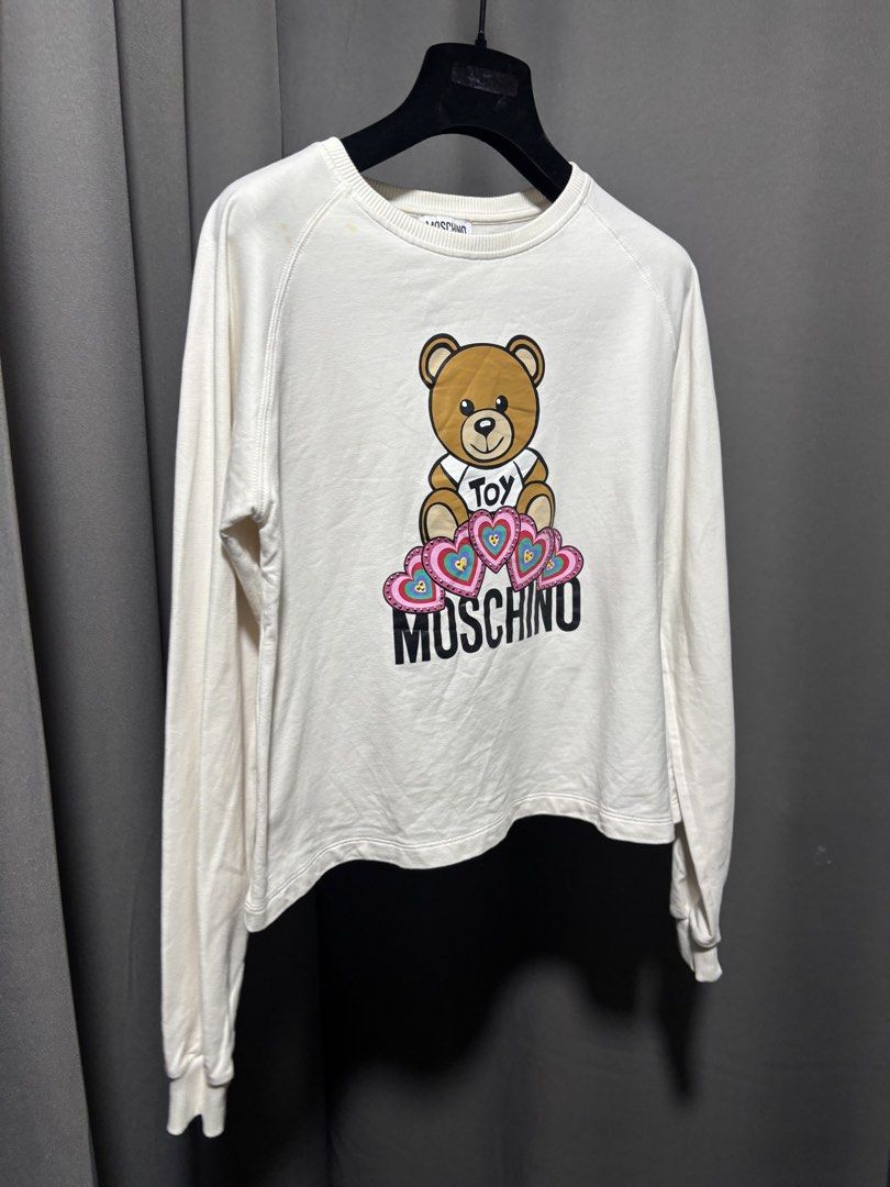 Moschino Sweater Bear (Category: Activewear) located in Baguio. Submitted by thecollector2600 (Listing ID 1460474280, Image 1). Description: Stain in the shoulder 17” x18”.
