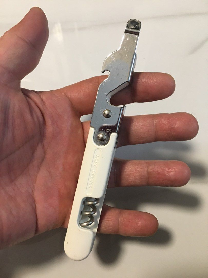 Multi-function Kitchen Tool - Can Opener, Bottle Opener, Corkscrew (Category: Other Kitchenware & Tableware) located in Pasay City. Submitted by gilbertso62551 (Listing ID 1460463546, Image 1). Description: - Versatile 3-in-1 kitchen gadget - Functions: Can opener, bottle opener, corkscrew - Features a comfortable white plastic handle - Durable, shiny metal components - Ideal for everyday kitchen use or outdoor adventures like picnics.