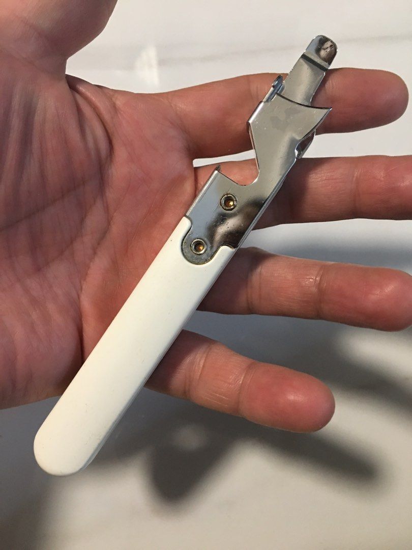 Multi-function Kitchen Tool - Can Opener, Bottle Opener, Corkscrew (Category: Other Kitchenware & Tableware) located in Pasay City. Submitted by gilbertso62551 (Listing ID 1460463546, Image 2). Description: - Versatile 3-in-1 kitchen gadget - Functions: Can opener, bottle opener, corkscrew - Features a comfortable white plastic handle - Durable, shiny metal components - Ideal for everyday kitchen use or outdoor adventures like picnics.