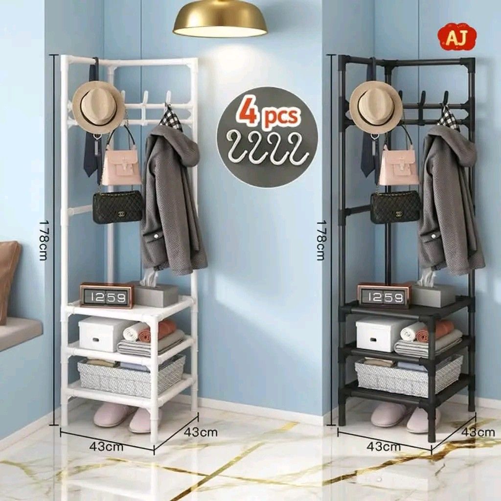Multifunctional Corner Coat Rack with Storage Shelves (Category: Shelves, Cabinets & Racks) located in Manila. Submitted by marvieobordo (Listing ID 1460410887, Image 1). Description: - Corner coat rack with multiple hooks for coats and hats. - Three shelves for shoes, bags, or other storage. - Available in white or black. - Easy to assemble, no tools required. - Dimensions: 43cm x 43cm x 178cm. - Perfect for maximizing corner space..