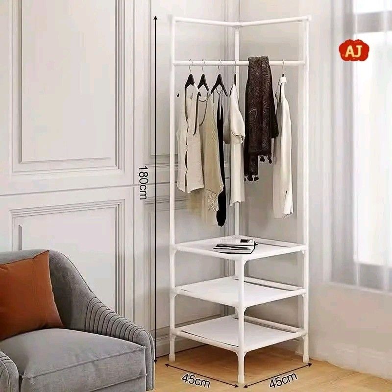 Multifunctional Corner Coat Rack with Storage Shelves (Category: Shelves, Cabinets & Racks) located in Manila. Submitted by marvieobordo (Listing ID 1460410887, Image 3). Description: - Corner coat rack with multiple hooks for coats and hats. - Three shelves for shoes, bags, or other storage. - Available in white or black. - Easy to assemble, no tools required. - Dimensions: 43cm x 43cm x 178cm. - Perfect for maximizing corner space..