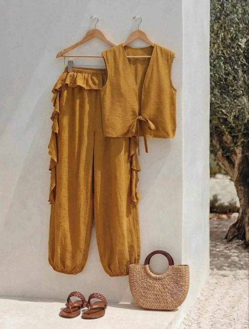 Mustard Yellow Tie-Front Coords Set (Category: Sets or Coordinates) located in Rizal. Submitted by gracefullykept (Listing ID 1460455740, Image 2). Description: - Item: Linen Blend / Crinkle Cotton Mustard Yellow Tie-Front Coords Set (Sleeveless Vest Top & Loose Wide-Leg Pants) - Size: S - Condition: Brandnew - Vibe: Boho Chic / Resortwear / Summer Vacation / Aesthetic Casual 🚛 MOD: J&T / Lalamove 💰 MOP: GCash 💌 Send a direct message for actua