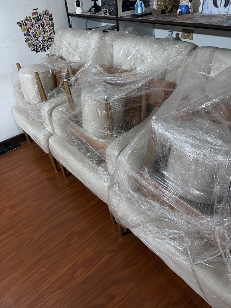 Nail Spa Chair (Category: Chairs) located in Caloocan City. Submitted by nadine.98 (Listing ID 1460325081, Image 2). Description: - Set includes: 1 white tufted wingback armchair, 1 matching ottoman, 1 small accent pillow. - Armchair features: High back, plush cushioning for ultimate comfort. - Ottoman features: Wooden base with a padded top. - ₱9,000 (All in) .