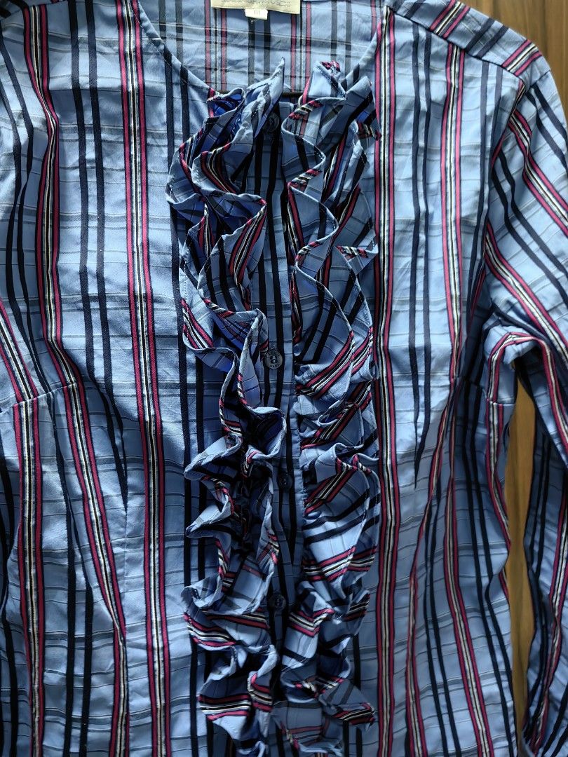 Nara Camicie Pin Stripe Long Sleeve Corporate (Category: Longsleeves) located in Taguig. Submitted by chielatte (Listing ID 1460419590, Image 3). Description: B38xL24 000141 blue striped long-sleeve blouse with a prominent ruffled front placket from Nara Camicie..