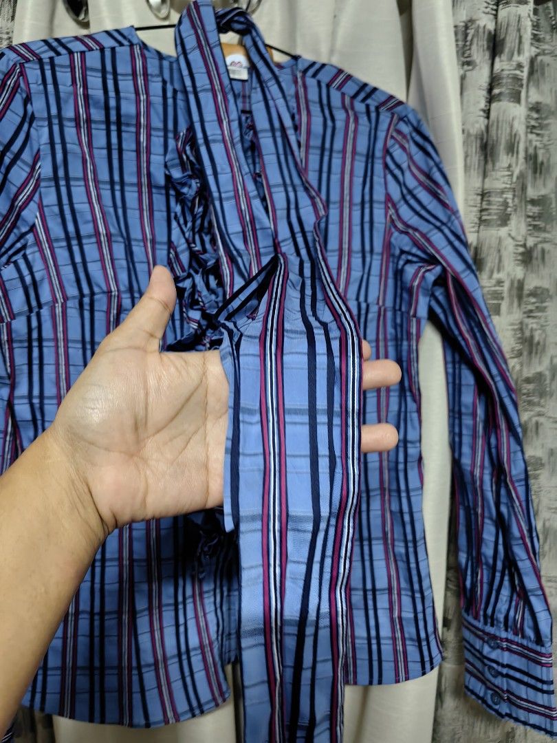 Nara Camicie Pin Stripe Long Sleeve Corporate (Category: Longsleeves) located in Taguig. Submitted by chielatte (Listing ID 1460419590, Image 2). Description: B38xL24 000141 blue striped long-sleeve blouse with a prominent ruffled front placket from Nara Camicie..