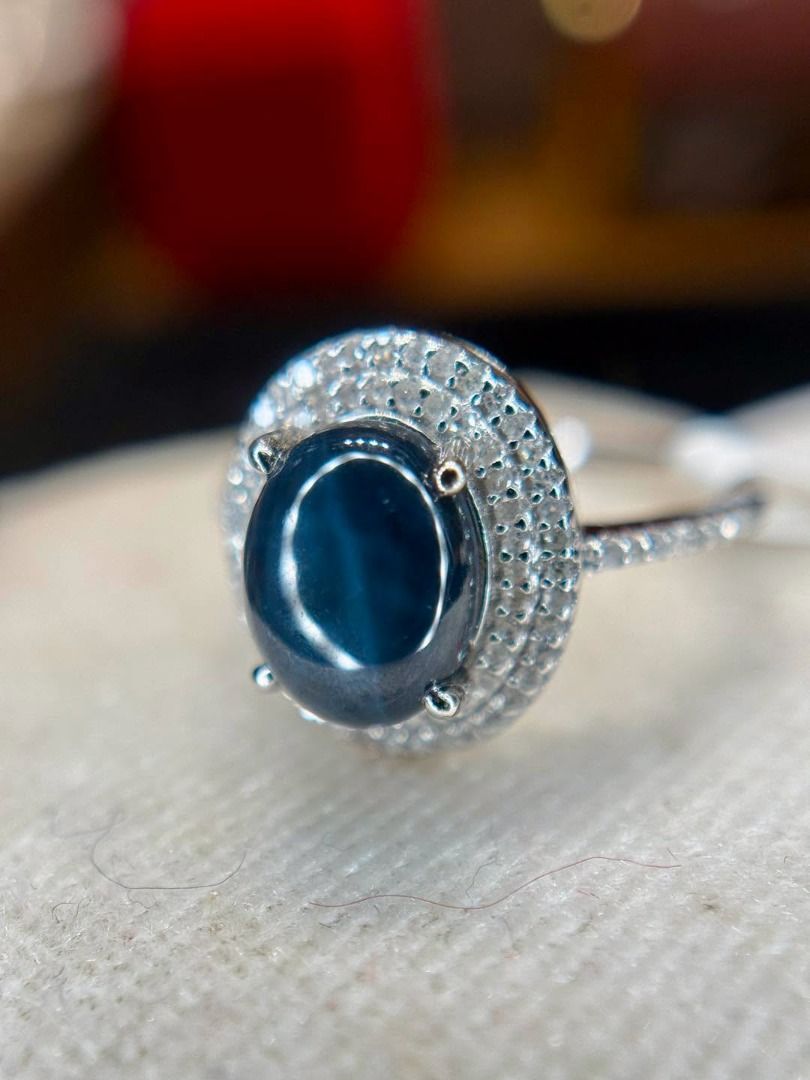 NATURAL BLUE SAPPHIRE STAR DIAMOND RING (Category: Rings) located in Baguio. Submitted by asna_taku (Listing ID 1460404255, Image 1). Description: 💙✨ NATURAL BLUE SAPPHIRE STAR DIAMOND RING ✨💙 A beautiful East African Natural Sapphire with a mesmerizing asterism effect—that gorgeous star-like glow that appears across the cabochon when it catches the light. ⭐️ 💙 Natural Sapphire ⭐️ Oval Cabochon with Induced Asterism 💎 Accented with numerous N