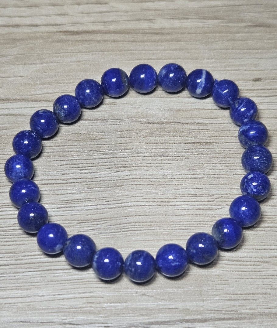 Natural Lapis Lazuli Stone Bead Bracelet (Category: Bracelets) located in Cainta. Submitted by Kahi0410 (Listing ID 1460468570, Image 1). Description: Natural Stone 8mm bead size 15 inch wrist size Garterized.