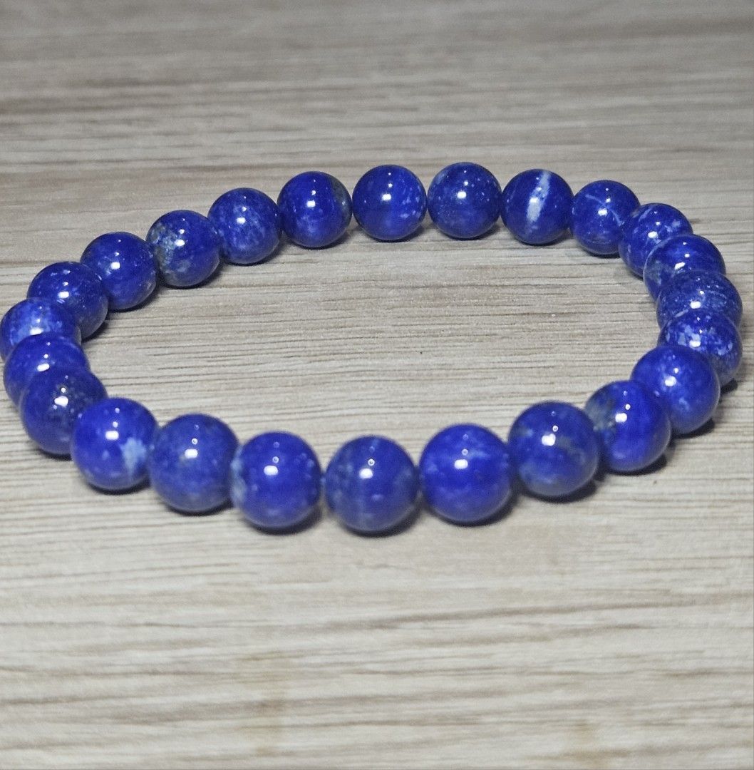 Natural Lapis Lazuli Stone Bead Bracelet (Category: Bracelets) located in Cainta. Submitted by Kahi0410 (Listing ID 1460468570, Image 2). Description: Natural Stone 8mm bead size 15 inch wrist size Garterized.