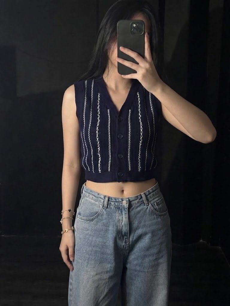 Navy Blue Knit Vest with White Stripes (Category: Sleeveless) located in Manila. Submitted by daintywears (Listing ID 1460396048, Image 1). Description: - Navy blue knit vest - V-neck design - Button-up front - White stripe detail - Cropped fit - Perfect for layering or wearing solo.