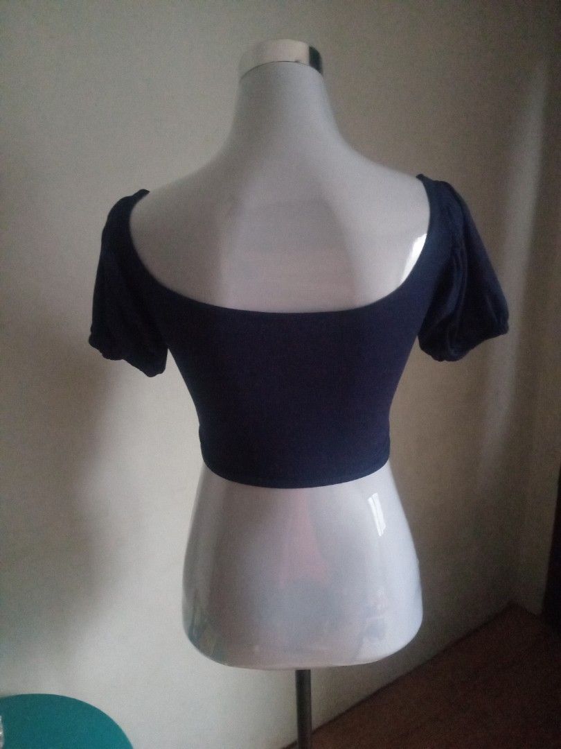 Navy Blue Puff Sleeve Square Neck Crop Top (Category: Blouses) located in Las Pinas. Submitted by scrappyday (Listing ID 1460388325, Image 3). Description: - Navy blue crop top - Features a chic square neckline - Adorable puff sleeves with elastic ends - Made from stretchy material for comfort - Versatile piece, pairs perfectly with high-waisted bottoms - Ideal for casual outings and everyday style.