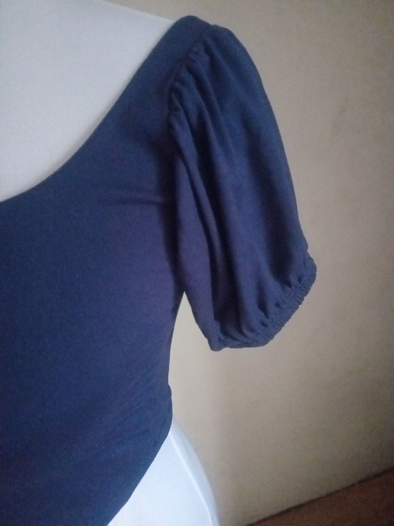 Navy Blue Puff Sleeve Square Neck Crop Top (Category: Blouses) located in Las Pinas. Submitted by scrappyday (Listing ID 1460388325, Image 2). Description: - Navy blue crop top - Features a chic square neckline - Adorable puff sleeves with elastic ends - Made from stretchy material for comfort - Versatile piece, pairs perfectly with high-waisted bottoms - Ideal for casual outings and everyday style.