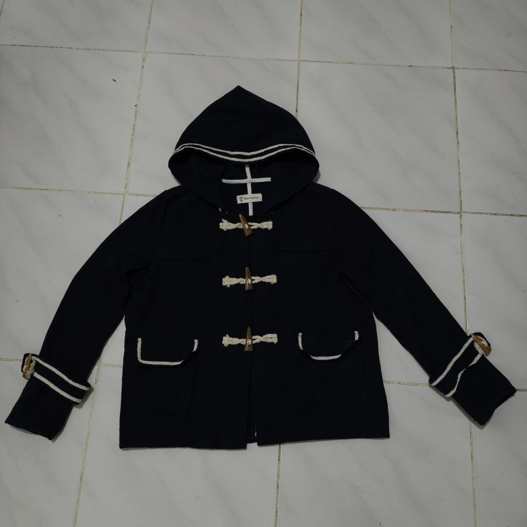 Navy Sailor Duffle Coat (Category: Coats, Jackets and Outerwear) located in Naga. Submitted by declutter_it (Listing ID 1460369588, Image 1). Description: SIZE: S-M DETAILS - 3 front toggle closures + hidden inner zip - 2 front patch pockets - Hood with white double stripes - Buckle-adjustable cuffs FLAWS - Minor fuzzing/pilling on fabric (normal wear) - Very faint light marks — not noticeable when worn - No major damage; all toggles & buckles in