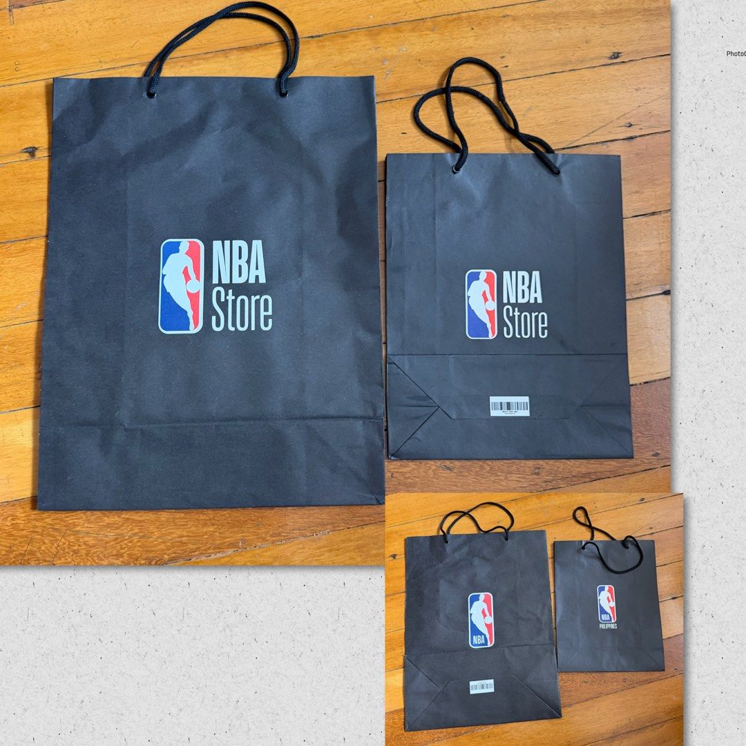 NBA Paper bags Large & Medium (Category: Gift Baskets & Hampers) located in Paranaque City. Submitted by crew08 (Listing ID 1460374688, Image 1). Description: NEW NBA shopping bag LARGE & Medium - LxHxW 17x13x6 inches for Large; 12x9.5x4 inches - NEW Very clean NO creases on paper -Meant for gift, organizing etc Large ₱150 Medium ₱100.