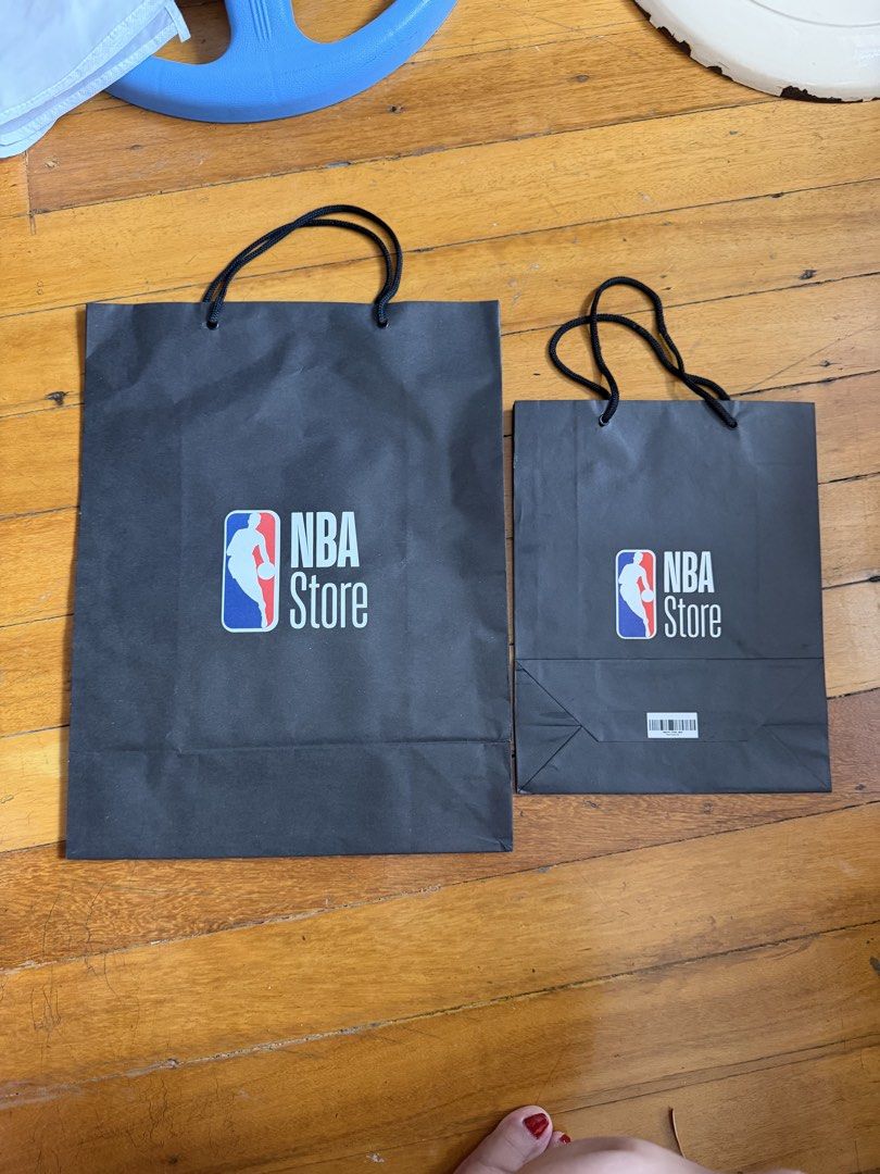 NBA Paper bags Large & Medium (Category: Gift Baskets & Hampers) located in Paranaque City. Submitted by crew08 (Listing ID 1460374688, Image 3). Description: NEW NBA shopping bag LARGE & Medium - LxHxW 17x13x6 inches for Large; 12x9.5x4 inches - NEW Very clean NO creases on paper -Meant for gift, organizing etc Large ₱150 Medium ₱100.
