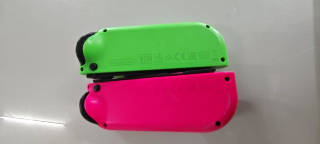 NEON NINTENDO SWITCH JOYCON (Category: Controllers) located in Tacloban City. Submitted by angel0al3ta (Listing ID 1460362084, Image 3). Description: NEON NINTENDO SWITCH JOYCON.