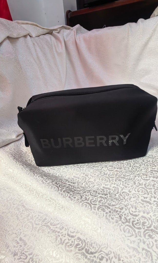 NEOPRENE BURBERRY CLUTCH BLACK (Category: Clutches) located in Tuguegarao City. Submitted by zenphoenix-7ad615 (Listing ID 1460341047, Image 1). Description: Black Burberry 9 by 5 by 4 inches.