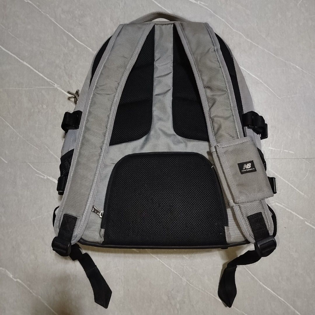 New Balance Grey Backpack Bag (Category: Backpacks) located in Davao. Submitted by vernoneighty4 (Listing ID 1460463585, Image 3). Description: - Grey New Balance backpack - Multiple compartments and pockets for organization - Padded straps for comfortable carrying - Side mesh pockets for water bottles - Made with durable material - Ideal for school, work, or travel.