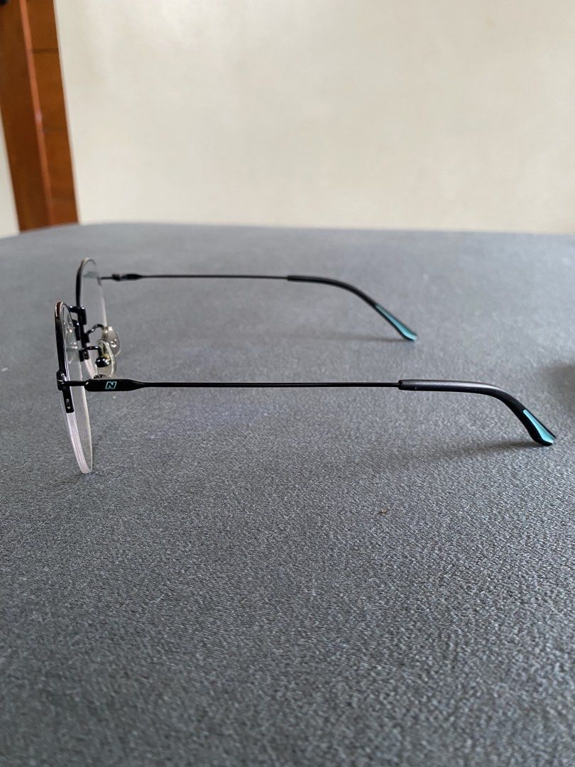 New Balance Prescription Frame Eyeglasses (Category: Sunglasses & Eyewear) located in Imus. Submitted by nnitzzuj (Listing ID 1460483321, Image 2). Description: - Lightly used - Sleek black rimless eyeglasses - Frame size: 51-21-145 - Ideal for everyday wear - Comes with hard case and cloth Free service sa ideal vision any branch! bought these for 4k before (frames).