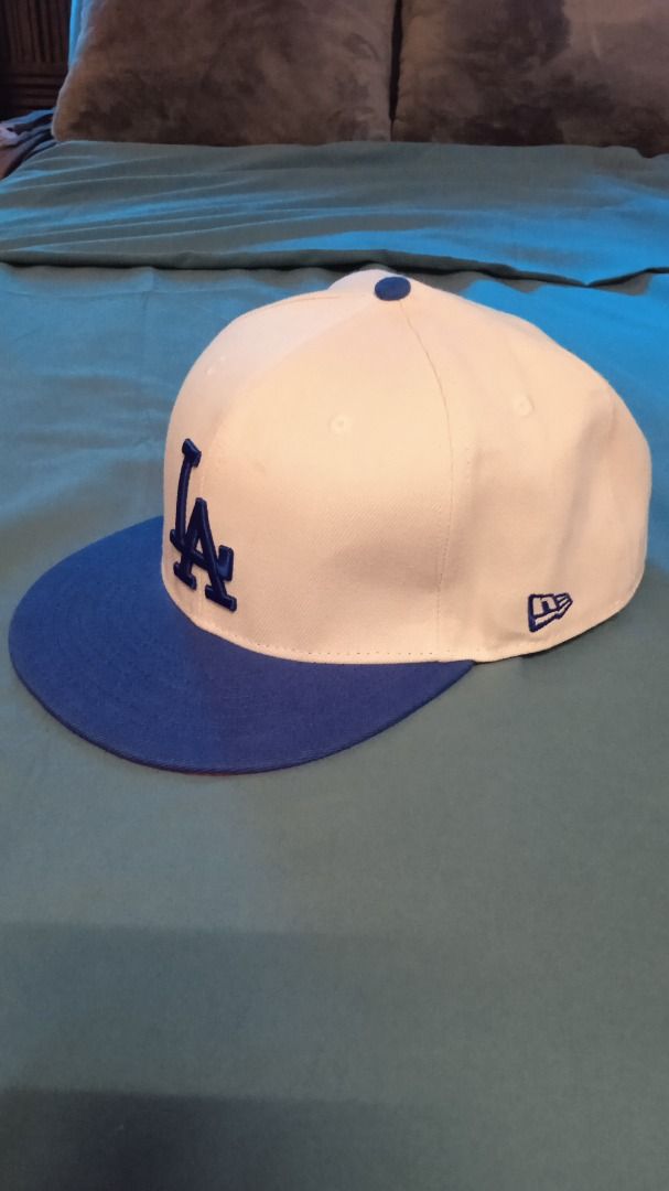 New Era LA Dodgers 1981 World Series Fitted Hat (Category: Caps & Hats) located in Manila. Submitted by 1rom_sns (Listing ID 1460338834, Image 1). Description: - Brand: New Era - Style: 59FIFTY Fitted Hat - Team: Los Angeles Dodgers - Color: White and Blue - Special Feature: 1981 World Series Patch on side - Size: 7 3/4 - Ideal for: Any LA Dodgers fan Lalamove Pick up Abono Rider.