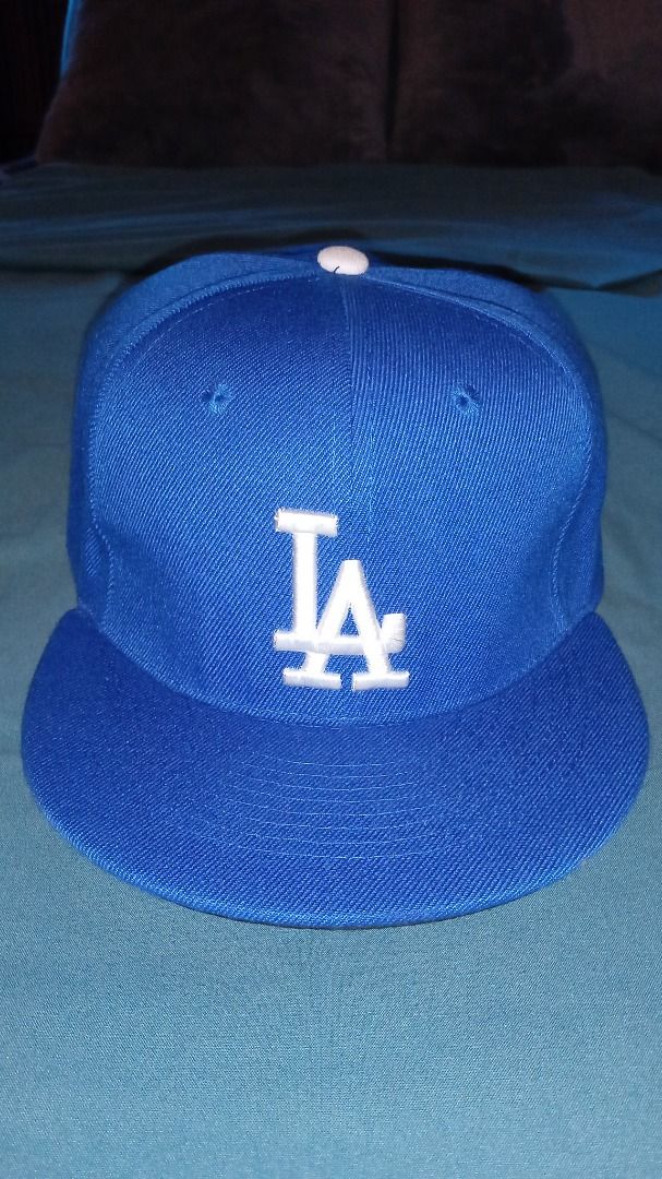 New Era LA Dodgers Baseball Cap (Category: Caps & Hats) located in Manila. Submitted by 1rom_sns (Listing ID 1460340324, Image 1). Description: - Brand new blue LA Dodgers cap - Authentic New Era product - Classic LA logo on the front - New Era logo embroidered on the side - MLB logo on the back - Flat brim style Lalamove pick up or personal Rider abono .