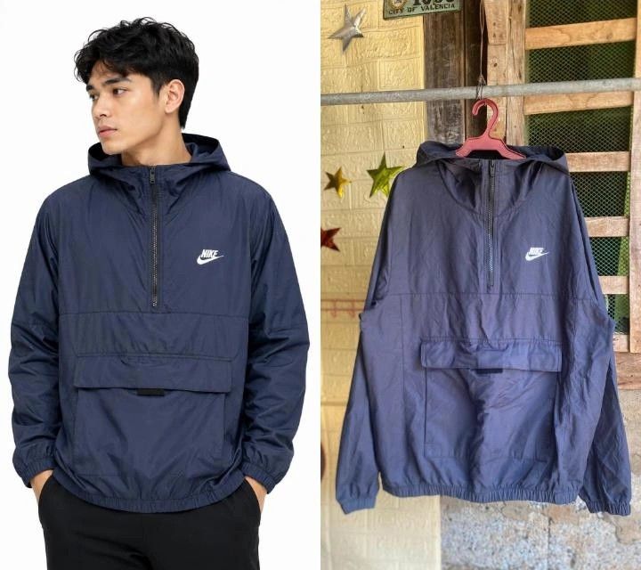 Nike Anorak Windbreaker Jacket Navy Blue (Category: Coats, Jackets and Outerwear) located in Valencia. Submitted by geronganog48710 (Listing ID 1460336783, Image 1). Description: Nike Essential Woven Anorak Jacket Medium on tag Dimes23x27 Excellent condition Color rate 9.8/10 No issue Mine 650📩📩 - Classic Nike anorak jacket - Pullover style with half-zip - Large front pocket with velcro closure - Hooded design - Elasticated cuffs and hem - Idea