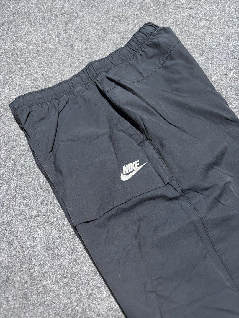 Nike Black Nylon Track Pants Joggers Size M (Category: Joggers) located in Cebu City. Submitted by andrewvivar29 (Listing ID 1460482932, Image 3). Description: - Brand: Nike - Color: Black - Material: Nylon - Waist: Elastic with drawstring - Pockets: Two side pockets - Size: Medium (M) - Features: Comfortable, lightweight - Ideal for: Everyday wear, workouts.