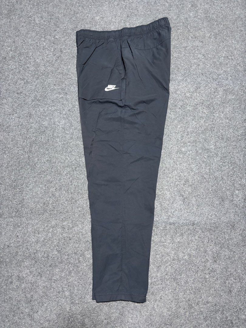 Nike Black Nylon Track Pants Joggers Size M (Category: Joggers) located in Cebu City. Submitted by andrewvivar29 (Listing ID 1460482932, Image 2). Description: - Brand: Nike - Color: Black - Material: Nylon - Waist: Elastic with drawstring - Pockets: Two side pockets - Size: Medium (M) - Features: Comfortable, lightweight - Ideal for: Everyday wear, workouts.