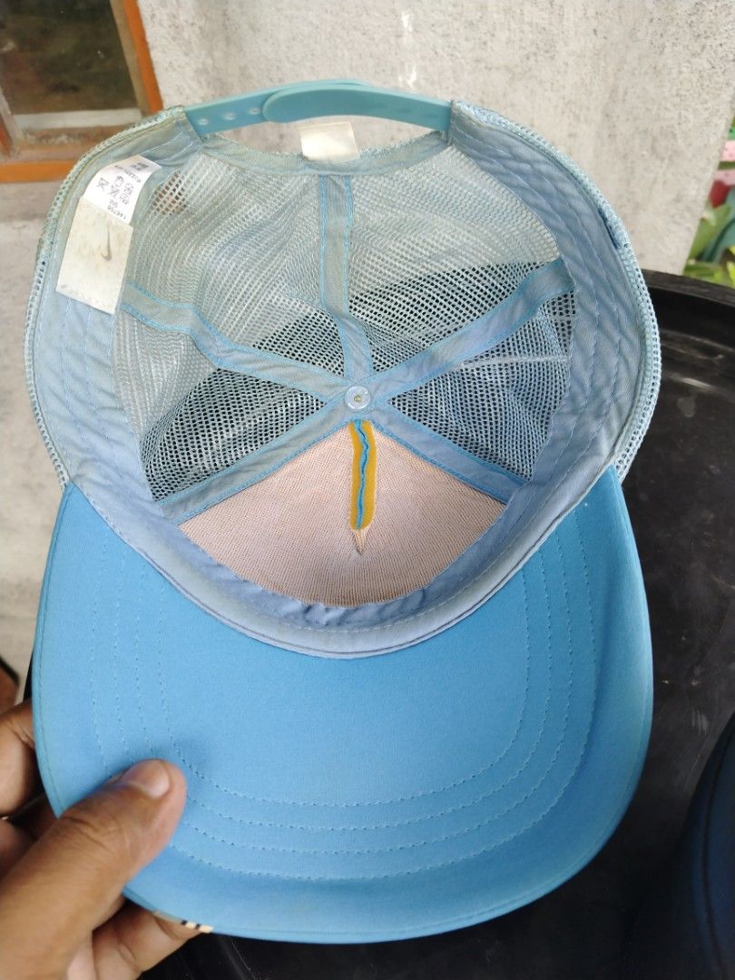 Nike Blue Trucker Cap One Size (Category: Caps & Hats) located in Legazpi City. Submitted by genobecollectives (Listing ID 1460307709, Image 3). Description: vintage Nike trucker cap 700 free ship - Breathable mesh back - Adjustable snapback closure - Iconic Nike swoosh logo on front - Ideal for casual wear or sports -one size fits all dm📩.