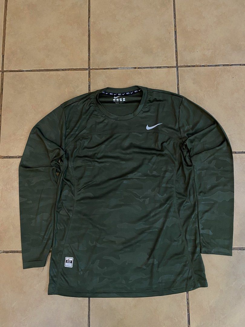 NIKE CAMOUFLAGE DRI FIT LONG SLEEVE (Category: Hoodies) located in Manila. Submitted by sebthrift (Listing ID 1460370773, Image 1). Description: .