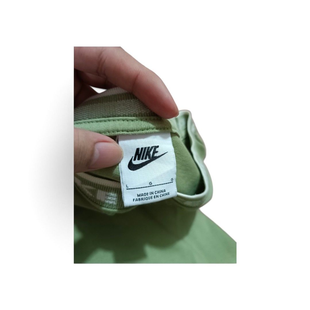 Nike Club Shirt (Category: Tshirts & Polo Shirts ) located in Manila. Submitted by southstreethub.ph (Listing ID 1460429761, Image 3). Description: - Nike Club Shirt - Condition: Very Good Condition - Size: Large - 20W 28L - Features iconic Nike logo on chest - Collar has repeating Nike text detail - Price: 699 .