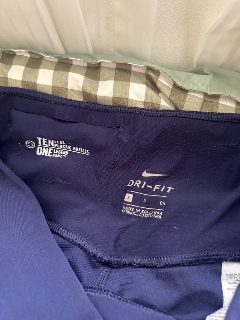 Nike Dri-Fit "Just Do It" Leggings (Category: Activewear) located in Manila. Submitted by newcrystal-701b (Listing ID 1460336696, Image 2). Description: - Navy blue Nike Dri-Fit leggings - Size: Small - "Just Do It" slogan in bold coral outline down the legs - Made from 10 recycled plastic bottles - Comfortable and versatile for workouts or casual wear.