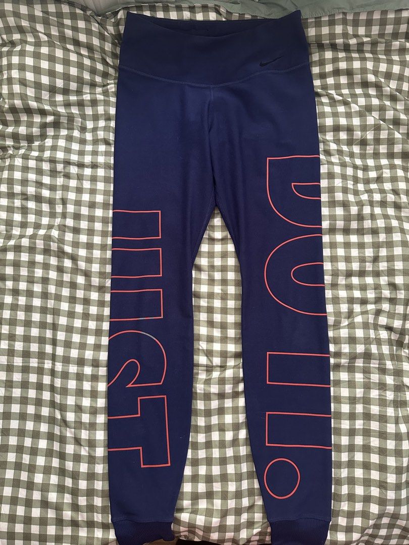 Nike Dri-Fit "Just Do It" Leggings (Category: Activewear) located in Manila. Submitted by newcrystal-701b (Listing ID 1460336696, Image 1). Description: - Navy blue Nike Dri-Fit leggings - Size: Small - "Just Do It" slogan in bold coral outline down the legs - Made from 10 recycled plastic bottles - Comfortable and versatile for workouts or casual wear.