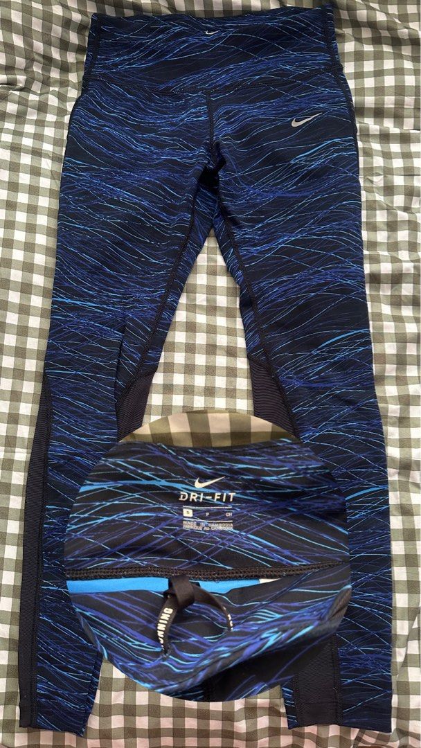 Nike Dri-Fit Running Leggings Blue Pattern Size S (Category: Activewear) located in Manila. Submitted by newcrystal-701b (Listing ID 1460338236, Image 3). Description: - Nike Dri-Fit running leggings - Stylish blue and black abstract pattern - Breathable mesh panels on the sides - Secure drawstring waist - Perfect for workouts and running.