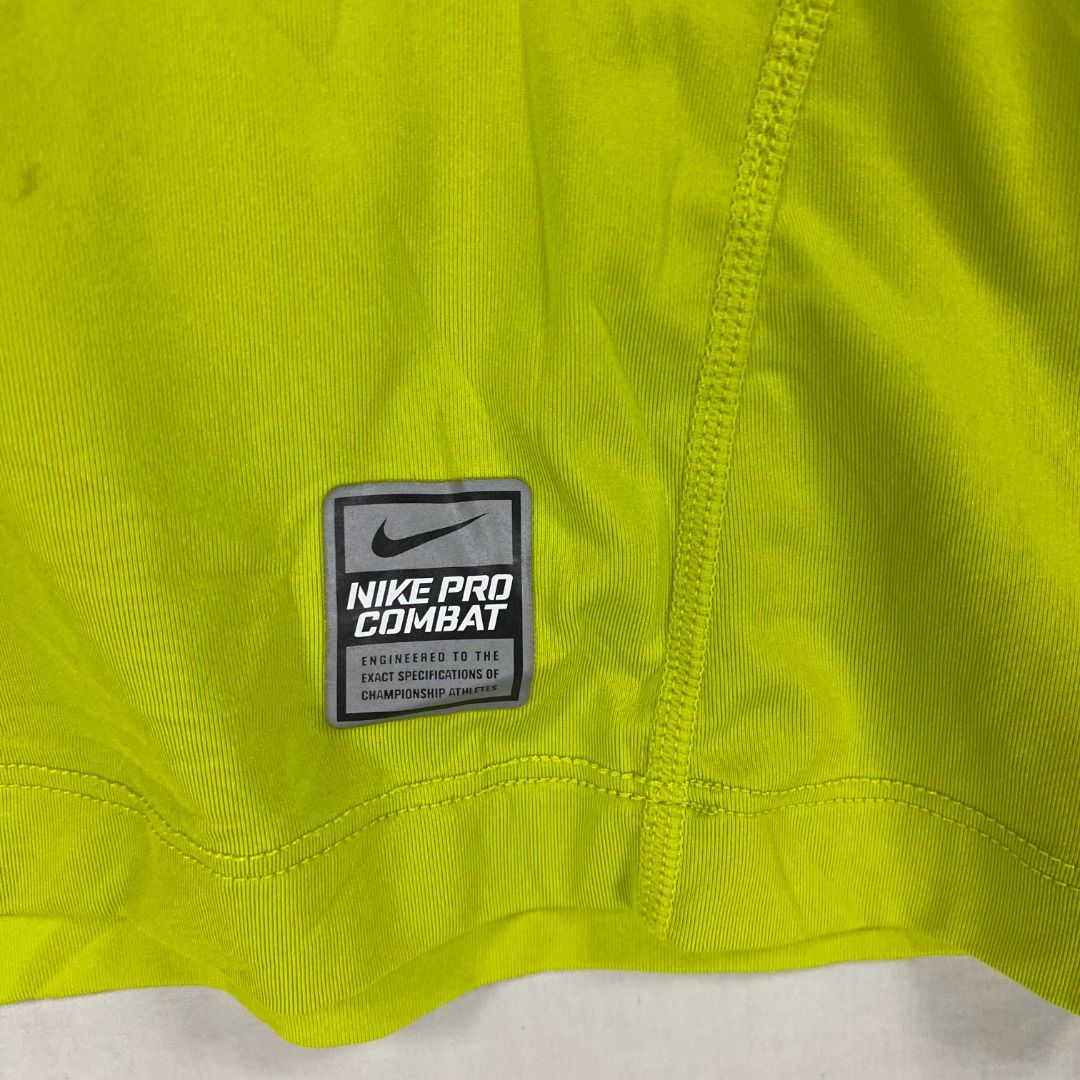 NIKE PRO COMBAT "Fitted" Technical Training Tee Volt Yellow / M (Category: Activewear) located in Antipolo. Submitted by canadafindss (Listing ID 1460491365, Image 2). Description: Visit & Follow Canada Finds for more premium thrift, streetwear, vintage, techwear, activewear, and branded finds from Canada 🇨🇦 More items posted regularly: https://www.carousell.ph/u/canadafindss NIKE PRO COMBAT "Fitted" Technical Training Tee Volt Yellow / M Built