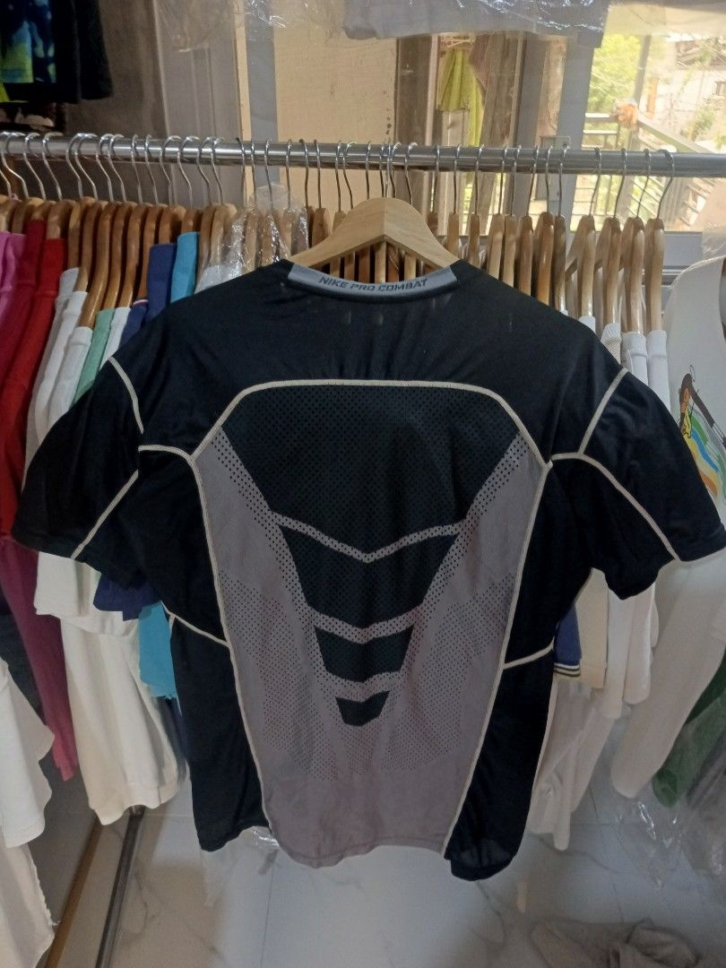 Nike Pro Combat Hypercool Compression T-shirt (Category: Activewear) located in Paniqui. Submitted by goodasold15 (Listing ID 1460345900, Image 1). Description: Black Nike Pro Combat Hypercool t-shirt. Compression fit. Made in Cambodia. Size L. Great for workouts or sports. Breathable mesh panels on the back. Short sleeves. Comfortable and functional..