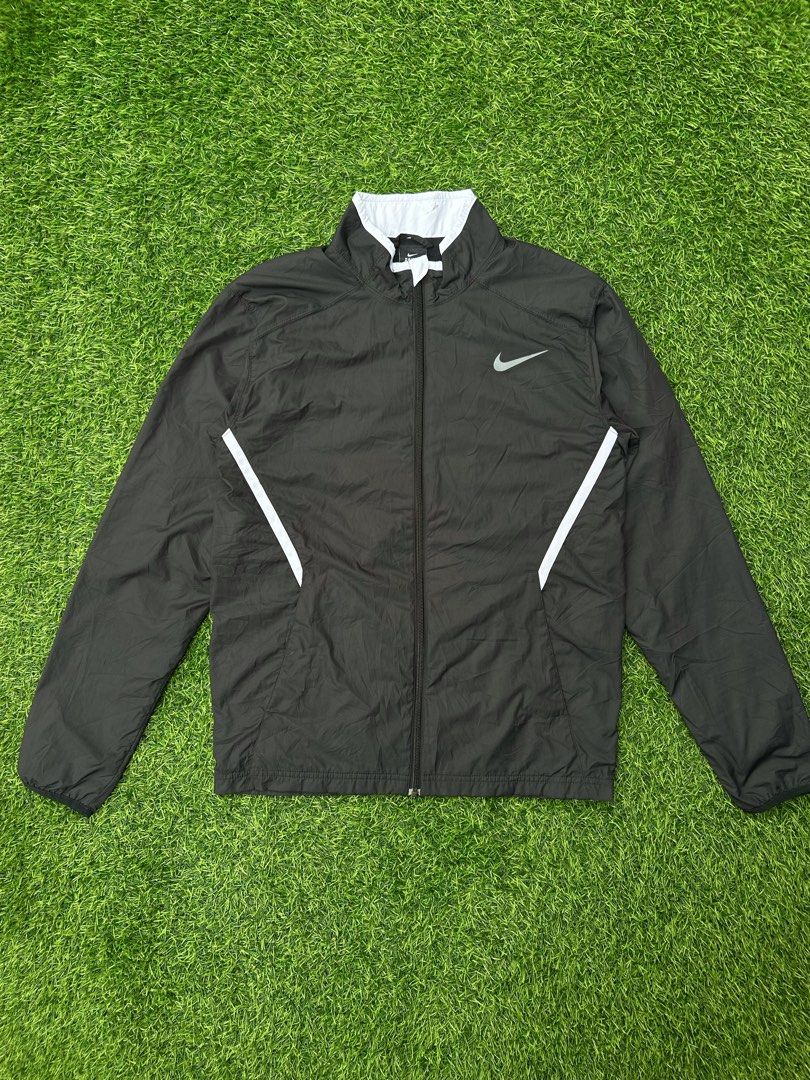 Nike Running Division Windbreaker Jacket (Category: Coats, Jackets and Outerwear) located in Davao. Submitted by echoloots (Listing ID 1460474283, Image 1). Description: Nike Running Division Windbreaker Jacket 22 x 25 (Small on tag) Color Rate - 9/10 Excellent Condition No Issues/Flaws 550 + Shipping Fee.
