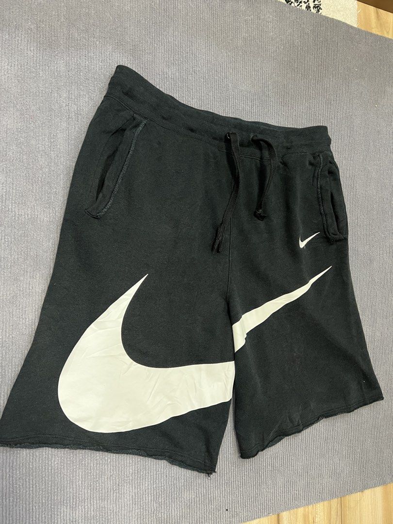 Nike swoosh shorts (Category: Shorts) located in Aparri. Submitted by amnorthloots (Listing ID 1460422552, Image 2). Description: Excellent Print logo 10/10 (no cracks. No hairlines) Color rate black (8.8/10) No issue Dimes Waistline 32”-40” Length 21”.