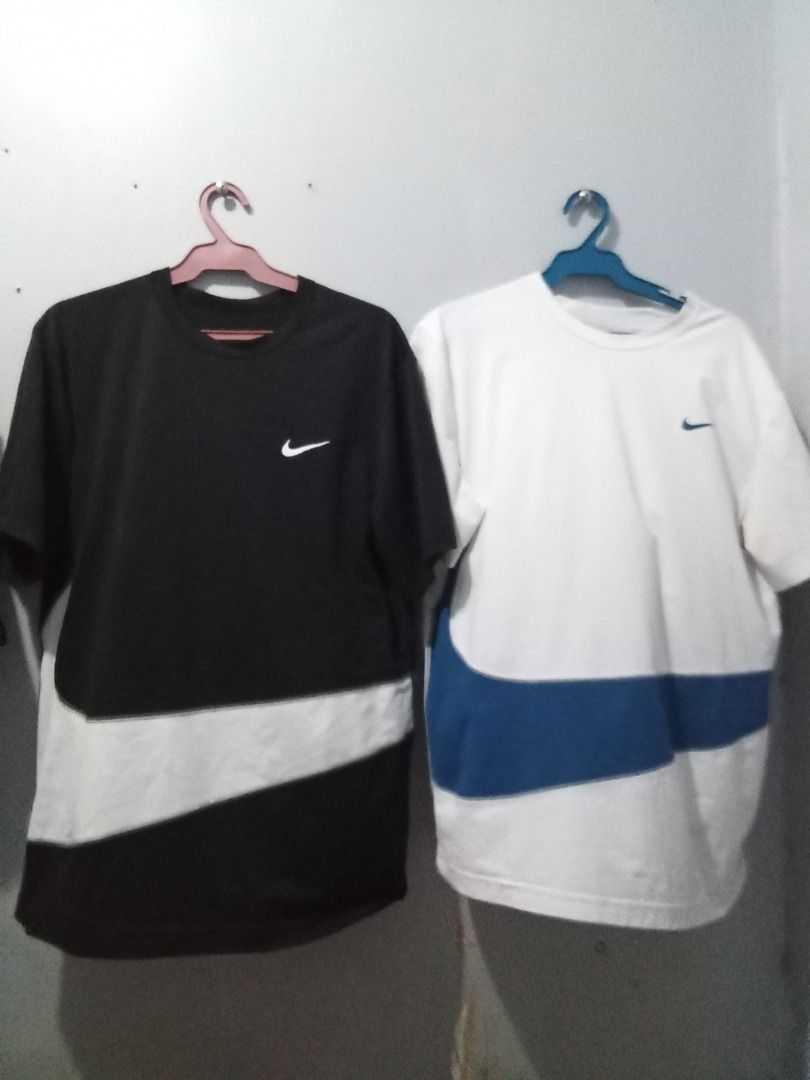 Nike T-Shirt Bundle - Black & White (Category: Tshirts & Polo Shirts ) located in Boljoon. Submitted by trip-to-the-thrift (Listing ID 1460481681, Image 1). Description: Get two Nike t-shirts drifit: one black with white swoosh, one white with blue swoosh. Both have chest logos. Perfect for casual wear. Buy both for a great deal! for more details message me size M can fit to large both in excellent condition .