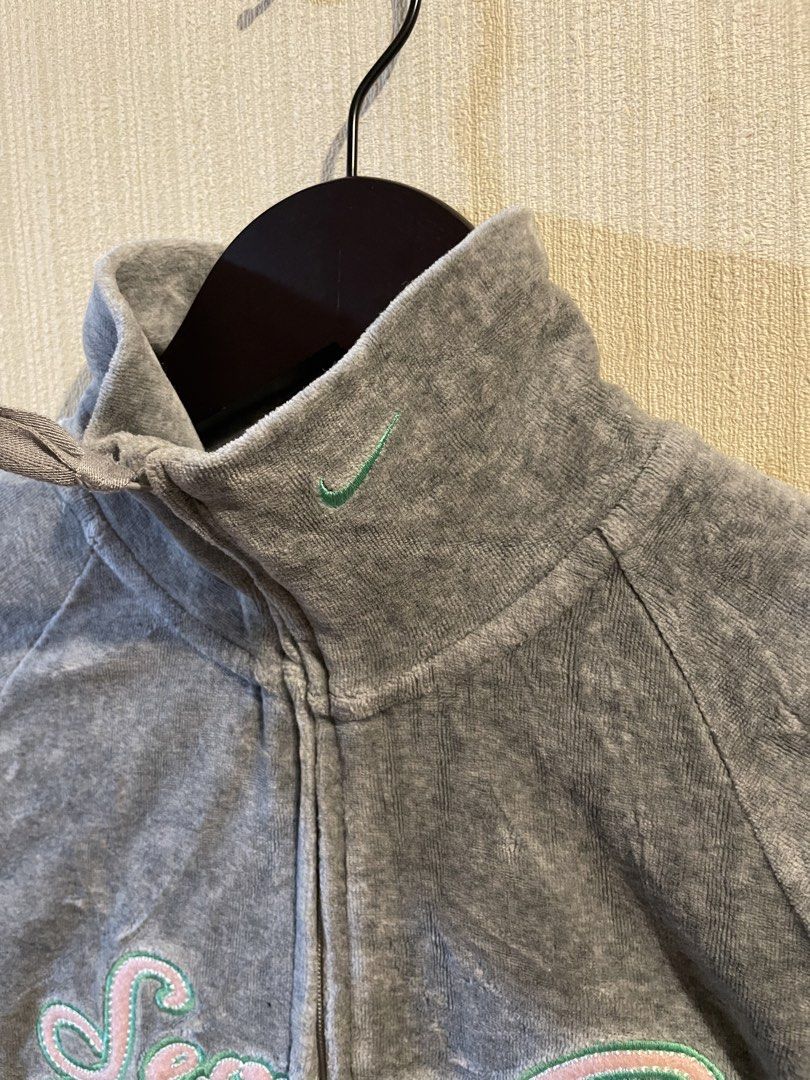 Nike Velour Tracksuit Set Grey "Seventy Two" (Category: Sets or Coordinates) located in Agoo. Submitted by omaethrift (Listing ID 1460331759, Image 3). Description: - Nike Grey Velour Tracksuit Set - Size: S - Jacket features 'Seventy Two' graphic - Pants have a flare leg and light green piping - Made in China - Ideal for lounging and casual wear.